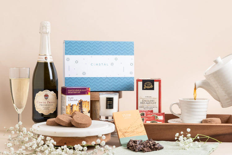 A thank you gift box hamper full of local artisan products including local tea, biscuits, candles, chocolate and prosecco. Local north east and newcastle gifts